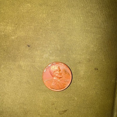 1956 D wheat penny with beautiful red colored. See photos for exact coin details