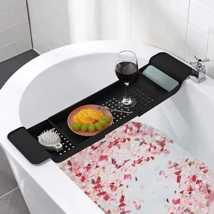 Tablette de salle de bain extensible noire pour éviter la chute des objets dans l'eau