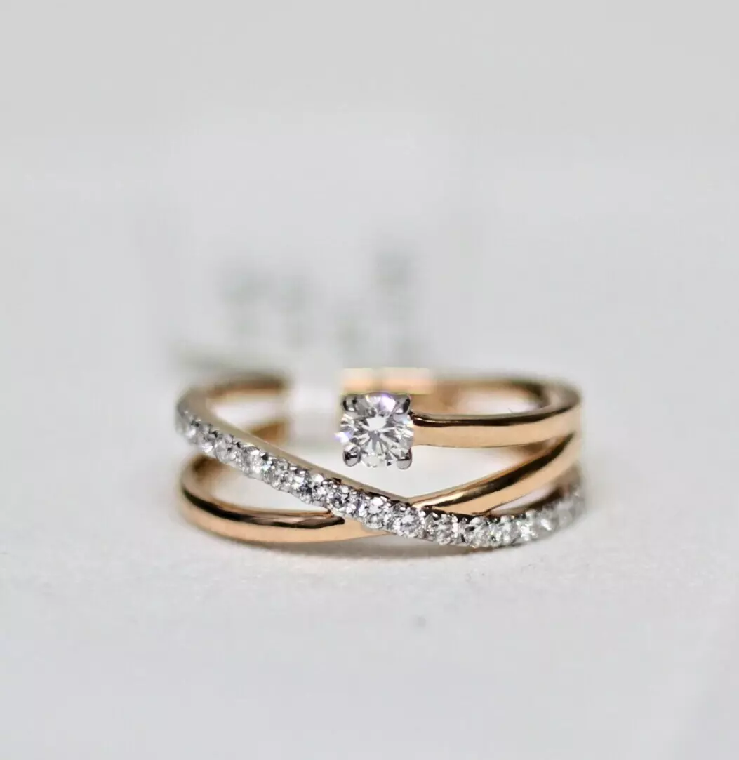 Double criss cross ring deals
