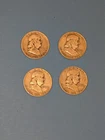 4 Franklin silver half dollars 1951,1952,1954,1957