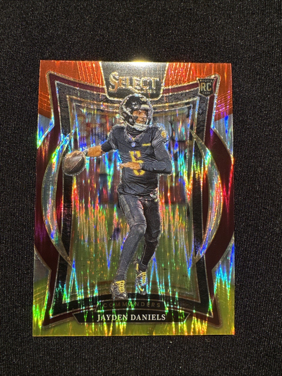 2024 Panini Select - Concourse Jayden Daniels #26 Red & Yellow Shock Prizm (RC)