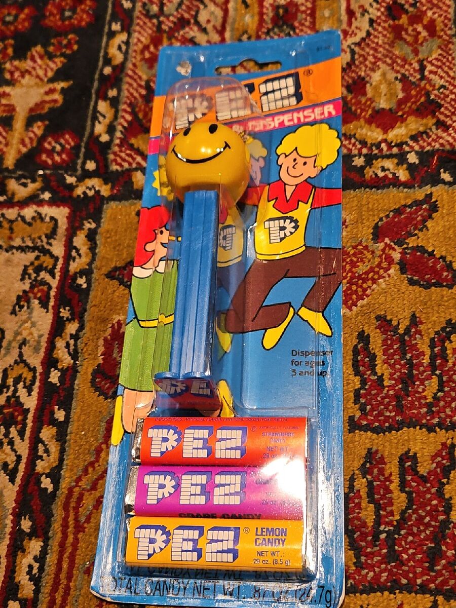 Vintage 1980's Pez Candy & Dispenser Sealed On Card Smiley Vintage 1980's Pez Candy & Dispenser Sealed On Card Smiley