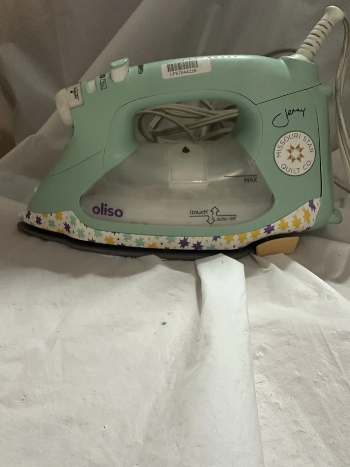 Plancha inteligente Missouri Star Jenny Oliso TG1600 ProPlus iTouch elevación automática Aqua GA3 Foto 2 de 4