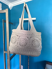 The Sak Cream Tote Lined Inner Pockets Silver Hardware Gold Underlay