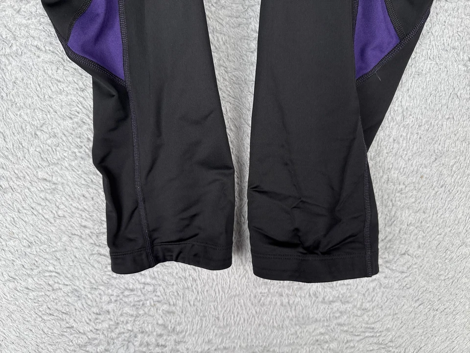Pantalones capri de ciclismo Pearl Izumi Select para mujer negros morados acolchados M medianos Foto 2 de 4