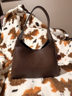 Brown purse with cherry charm. Brand new, never used.