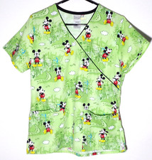Women's Scrub Top Featuring Mickey Mouse in front of City Scape by Disney, XS