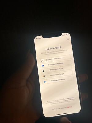 Three iPhones with TikTok installed 