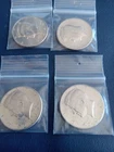 (B)  4 NIFC Kennedy Half Dollars