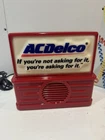 Lot Vintage NOS AC Delco AM/FM Radio, Spark Plug Phone, Battery Flask.
