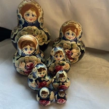 Vintage Woman Multicolor Hand Painted Russian Matryoshka Nesting Dolls 8pc