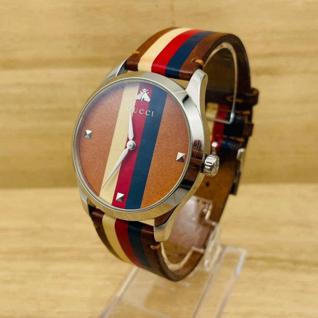 Montre analogique homme Gucci G Timeless cadran à rayures multicolores quartz KI250404057