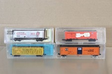 ATLAS MINITRIX N GAUGE RAKE of 4 AT&SF CARNATION MP PFE BOX CAR STOCK WAGON on