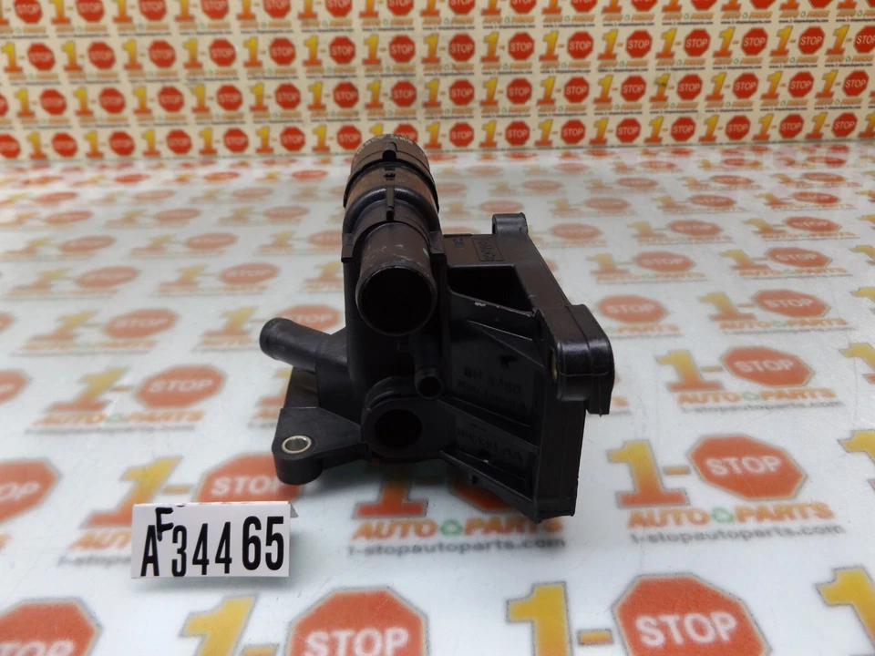 Ford Focus 2003-2007 termostato salida refrigerante crossover 6S4Z-8K556-A OEM Foto 2 de 4