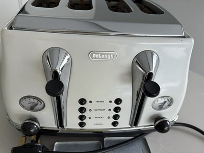 De'Longhi CTOC4003.W Icona 4-Scheiben-Toaster 1800 W cremeweiß funktioniert