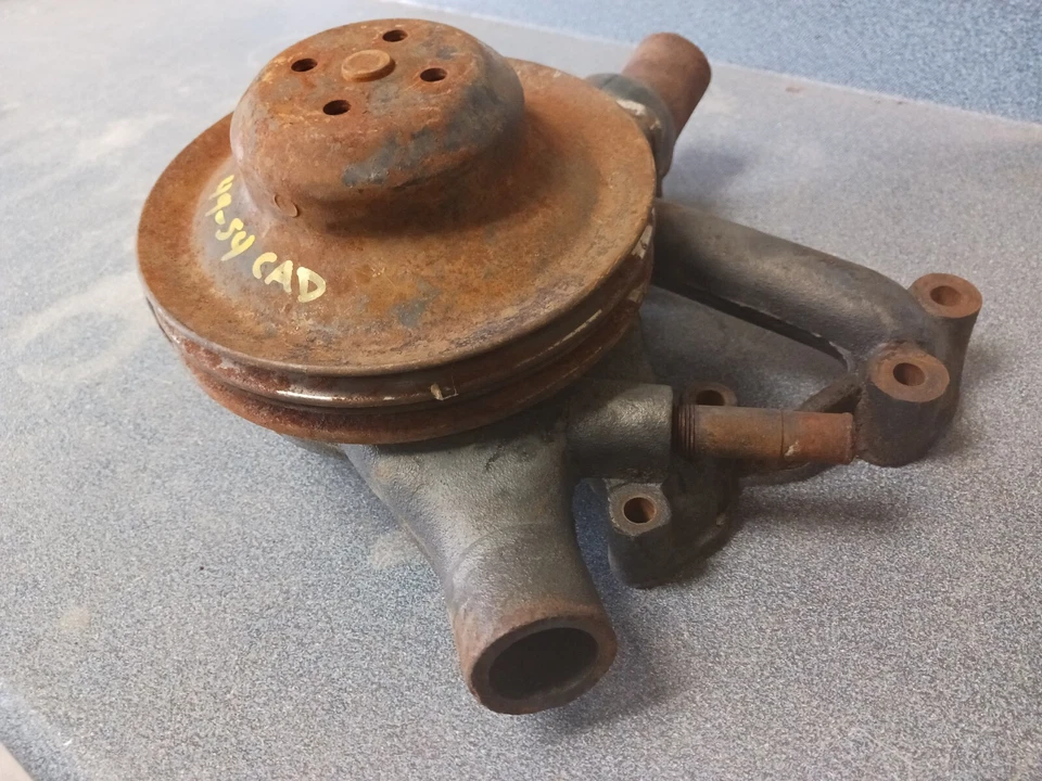 1949-1954 cadillac 365 water pump core, thermostat housing, and pulleys - Image 2 of 4