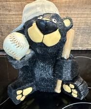 Hucha de oso negro banco de monedas gorra de béisbol y bate de béisbol raro