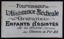Old painted cardboard sign: RAILWAY Medical Assistance for Children of the...