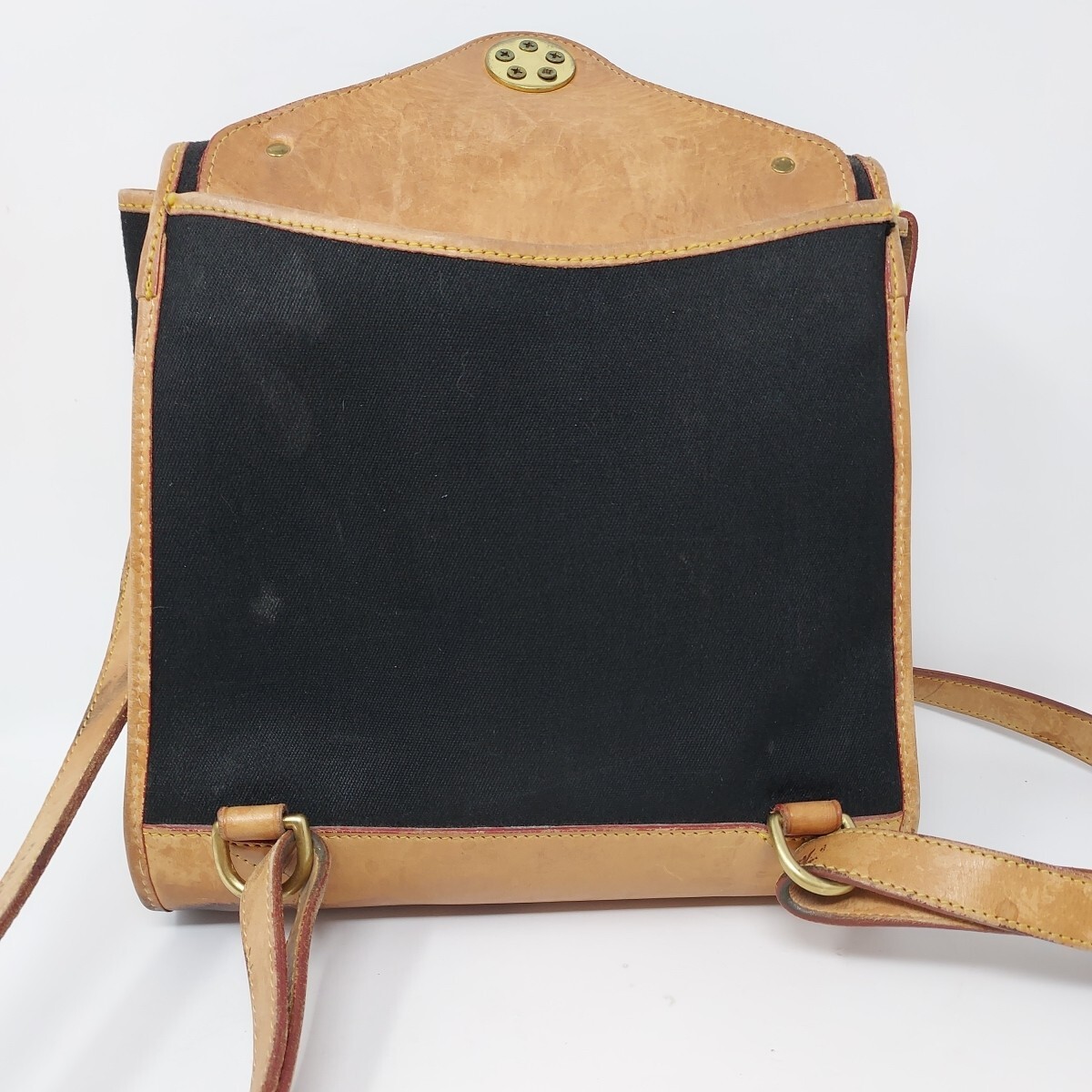 Dooney & Bourke Backpack Black Canvas Tan Leather Buckle 