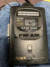 vintage aiwa am/fm radio and cassette player T100A with headphone