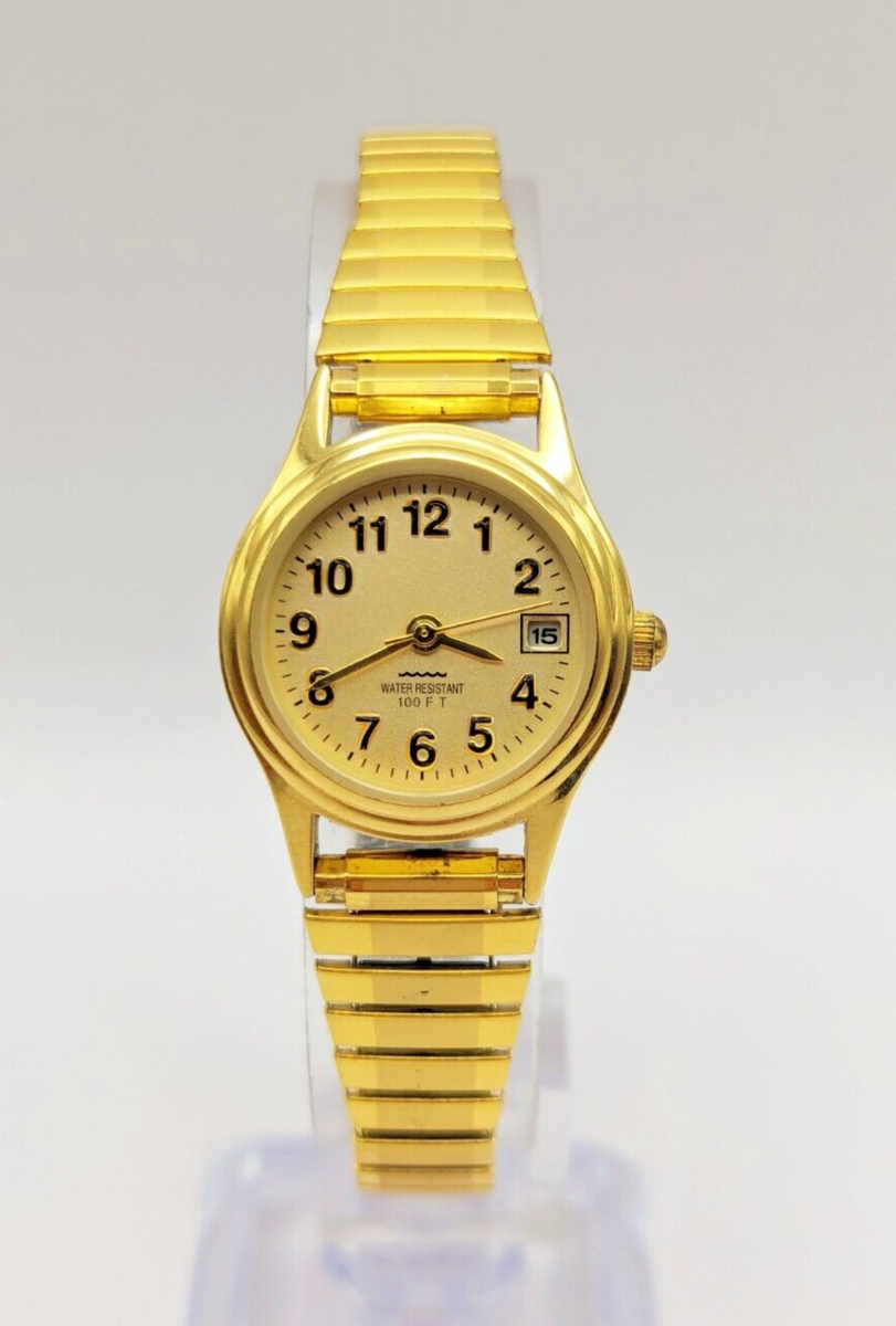 Elegant Women's Gold Tone Watch WR 100FT Date Indicator Keeps Time
