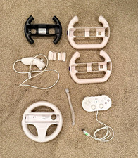 Lot of Xbox and Wii accessories controllers w...