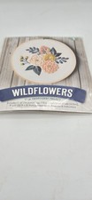 This is a Leisure Arts "Wildflowers" 11-piece embroidery kit.