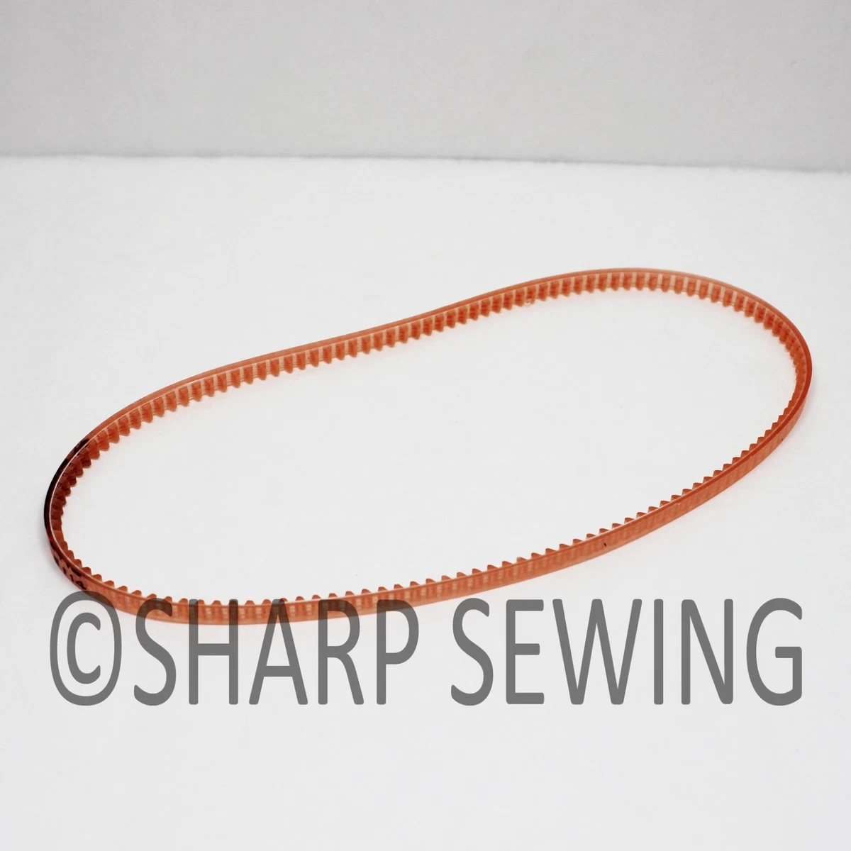 Sewing machine top motor belt
