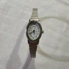 Vintage Timex Women’s Oval Watch Silver Tone Expansion Stretch Band - L7 2003