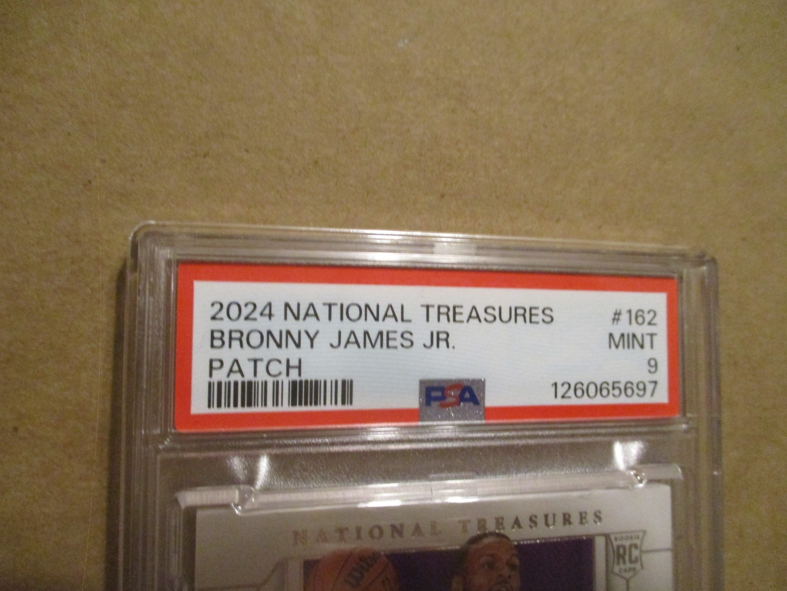 2024-25 NATIONAL TREASURES BRONNY JAMES JR #162 RC JUMBO 3 COLOR PATCH /99 PSA 9 view 2