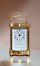 Quality French serpentine cased carriage clock by L