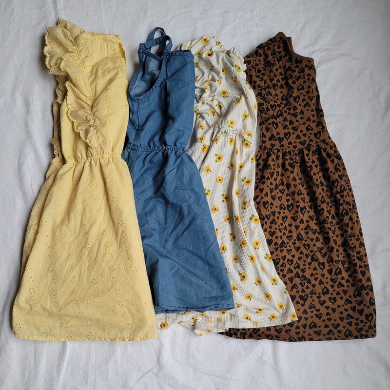 You get four (4) dress – size: 10, girls. Old Navy, BCBG and Heart+Arrow designs