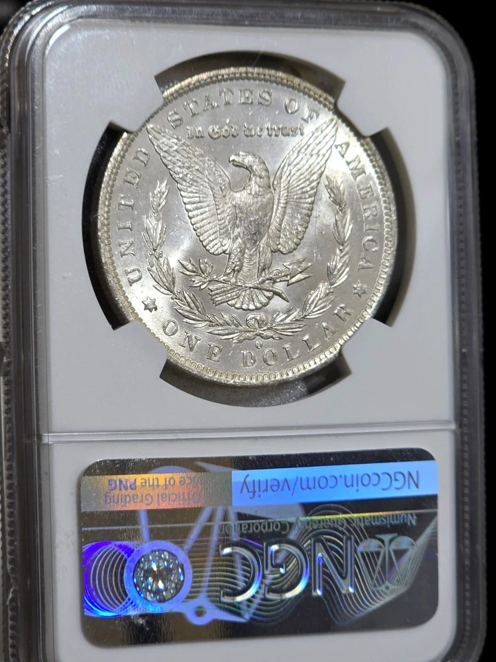 1885-O Morgan Silver Dollar NGC MS64 Rainbow Textile Tab Toned Coin Great Luster - Image 4 of 4