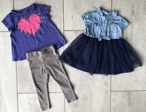 purple shirt and gray pants