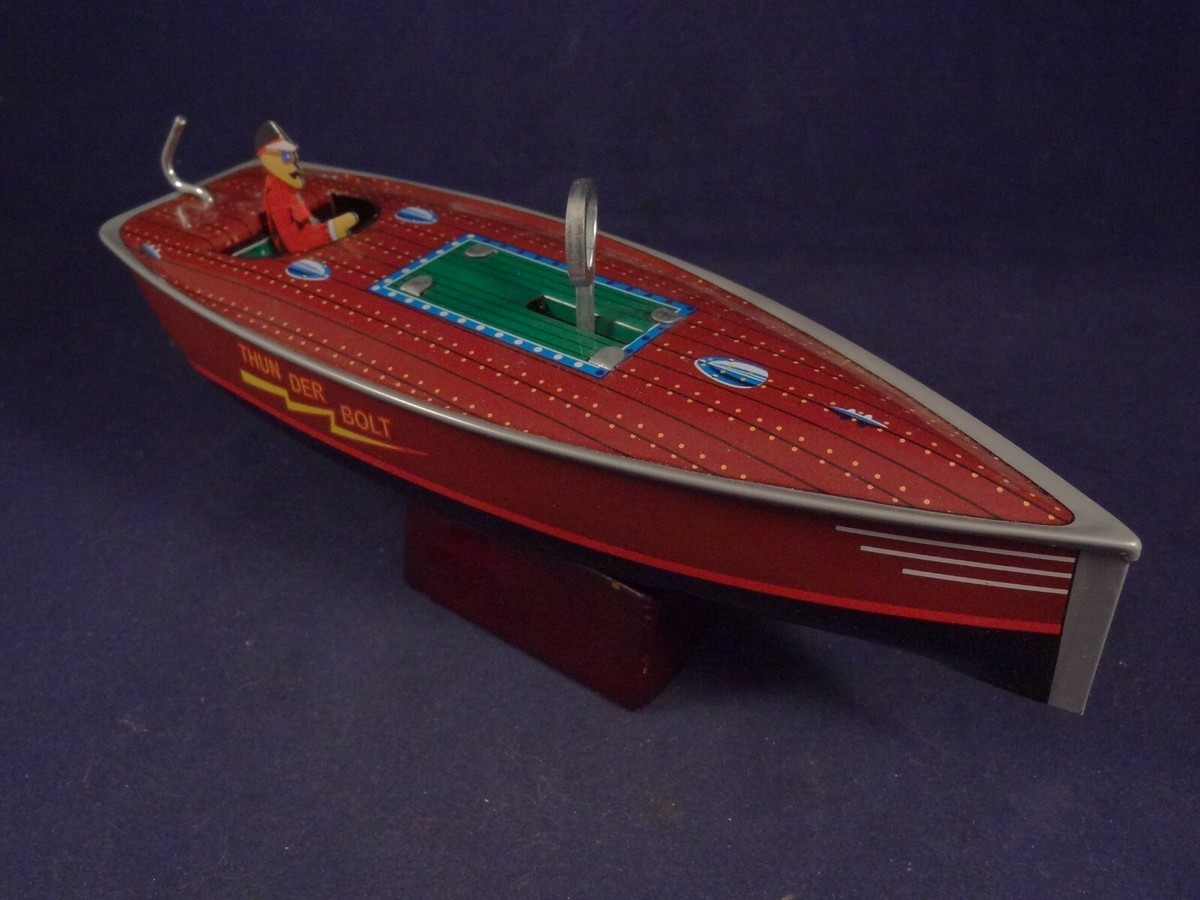 Bateau canot jouet mécanique tôle moteur clé St John tin boat
