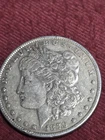 1879S MORGAN SILVER DOLLAR  IN NICELY CIRCULATED CONDITION SOME TONING