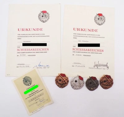 Schießabzeichen der Kampfgruppe der Arbeiterklasse mit Urkunden 4 Abzeichen - Bild 1 von 3