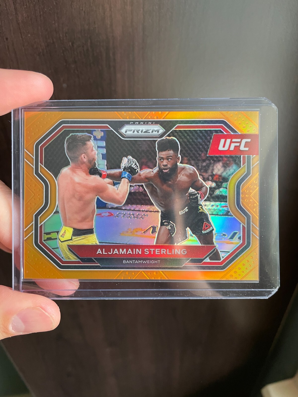 Aljamain Sterling Orange Prizm /99 - 2021 Panini Prizm UFC Debut #152