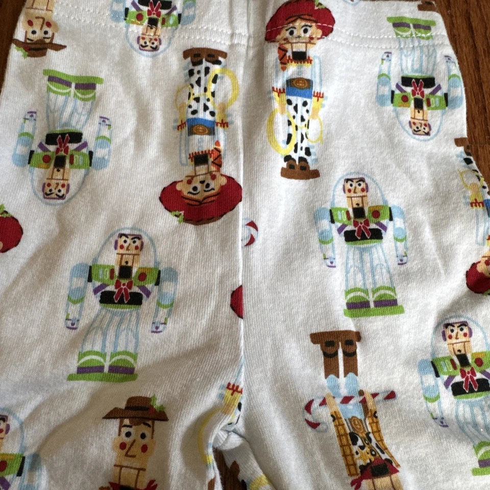 Рождественский детский пижамный набор EUC Disney Toy Story Buzz Woody Jessie Nutcracker 18 М - Изображение 3 из 4