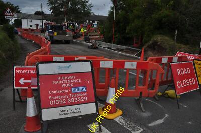 Photo 6x4 Broadclyst : Roadworks Dog Village Highway maintenance taking p c2015