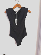 Women "Steve Madden" blk, sleeveless,padded shoulders bodysusit. Size XS