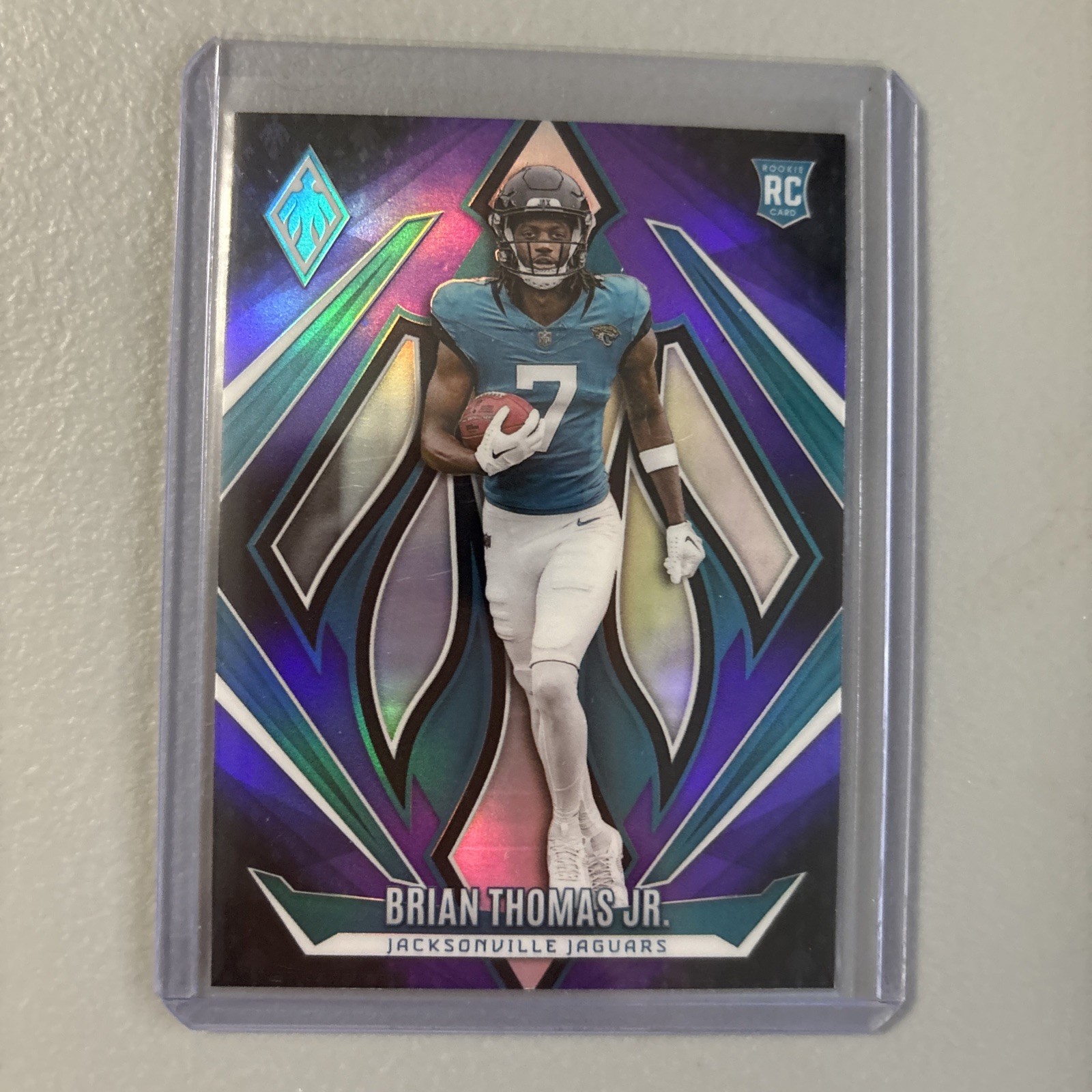 2024 Panini Phoenix - Rookies Brian Thomas Jr. #164 Purple Fade (RC)