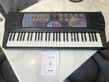 Vintage Casio CTK-560L 61 Key Keyboard Light Up Keys Song Book Working