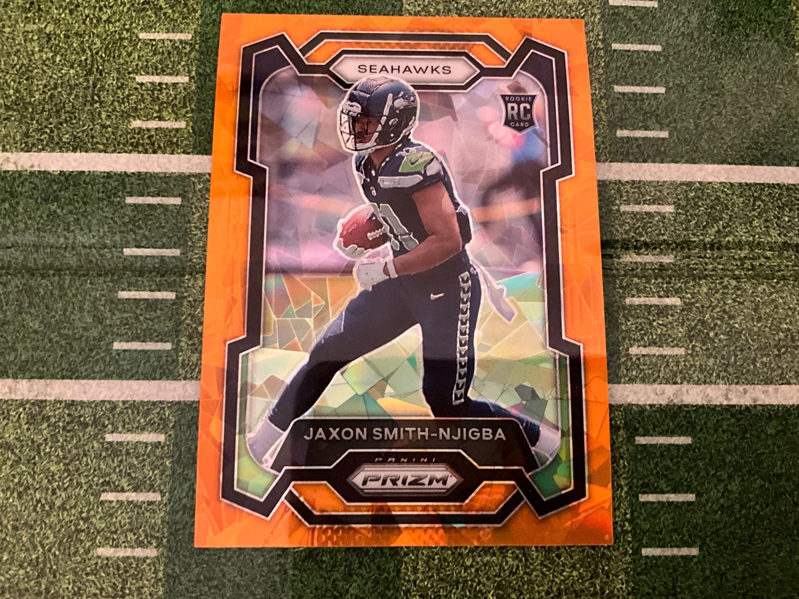 2023 Panini Prizm - Rookies Jaxon Smith-Njigba #390 Orange Ice Prizm (RC)