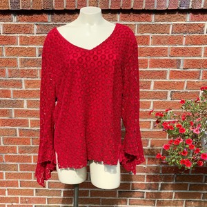 red flowy blouse