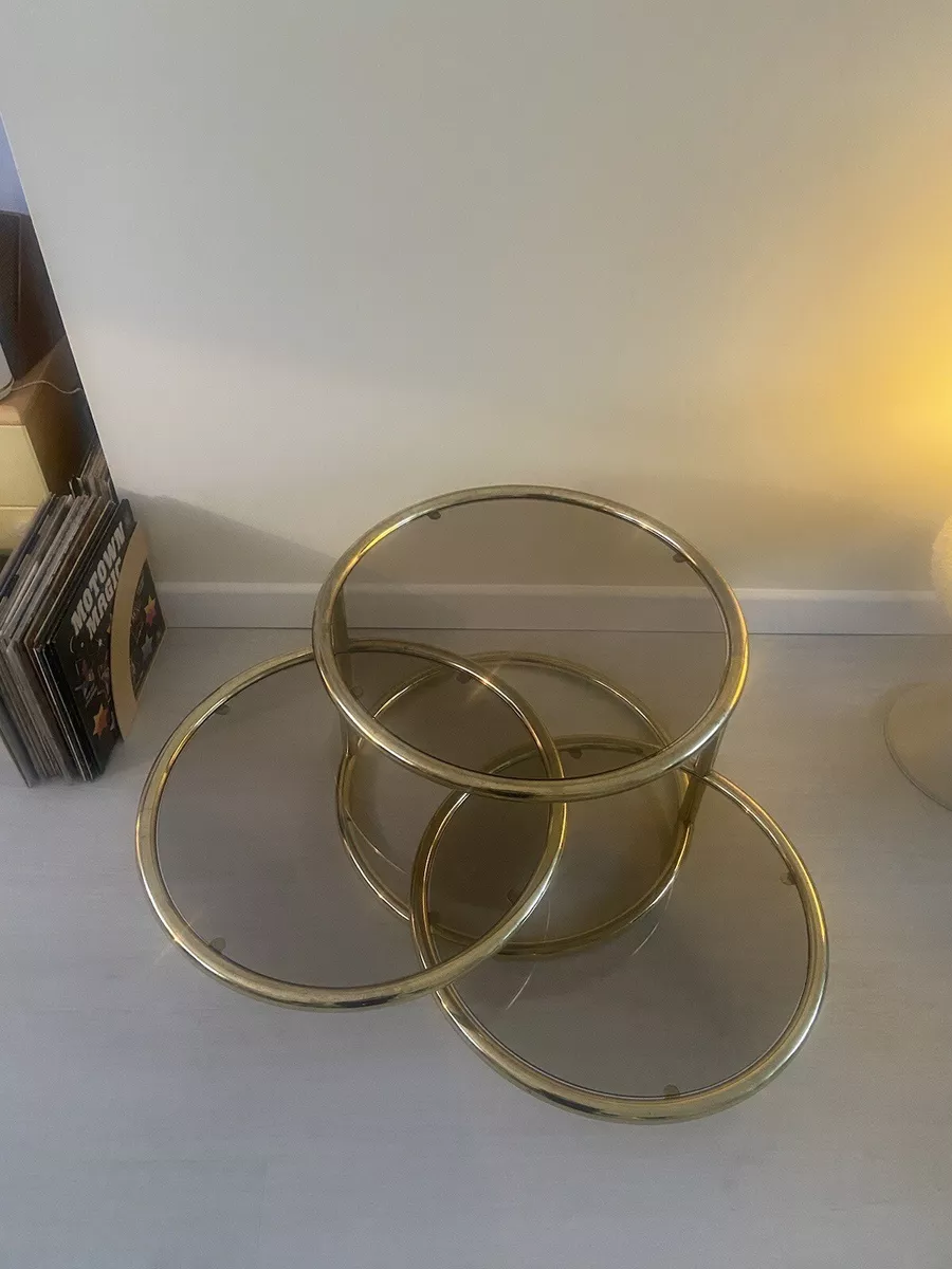 Brass swivel coffee on sale table