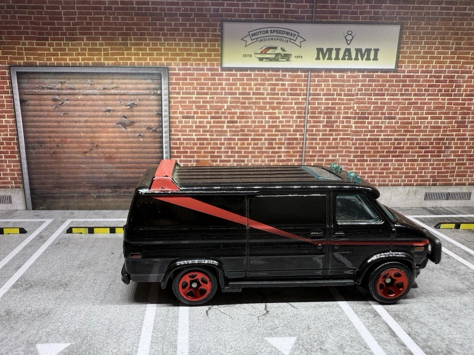 Hot Wheels 1983 GMC Vandura A-Team Van Black w/ Red Stripe 1:64 Diecast - Image 3 of 4