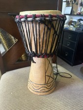 Traditional African djembe, a rope-tuned drum played with bare hands