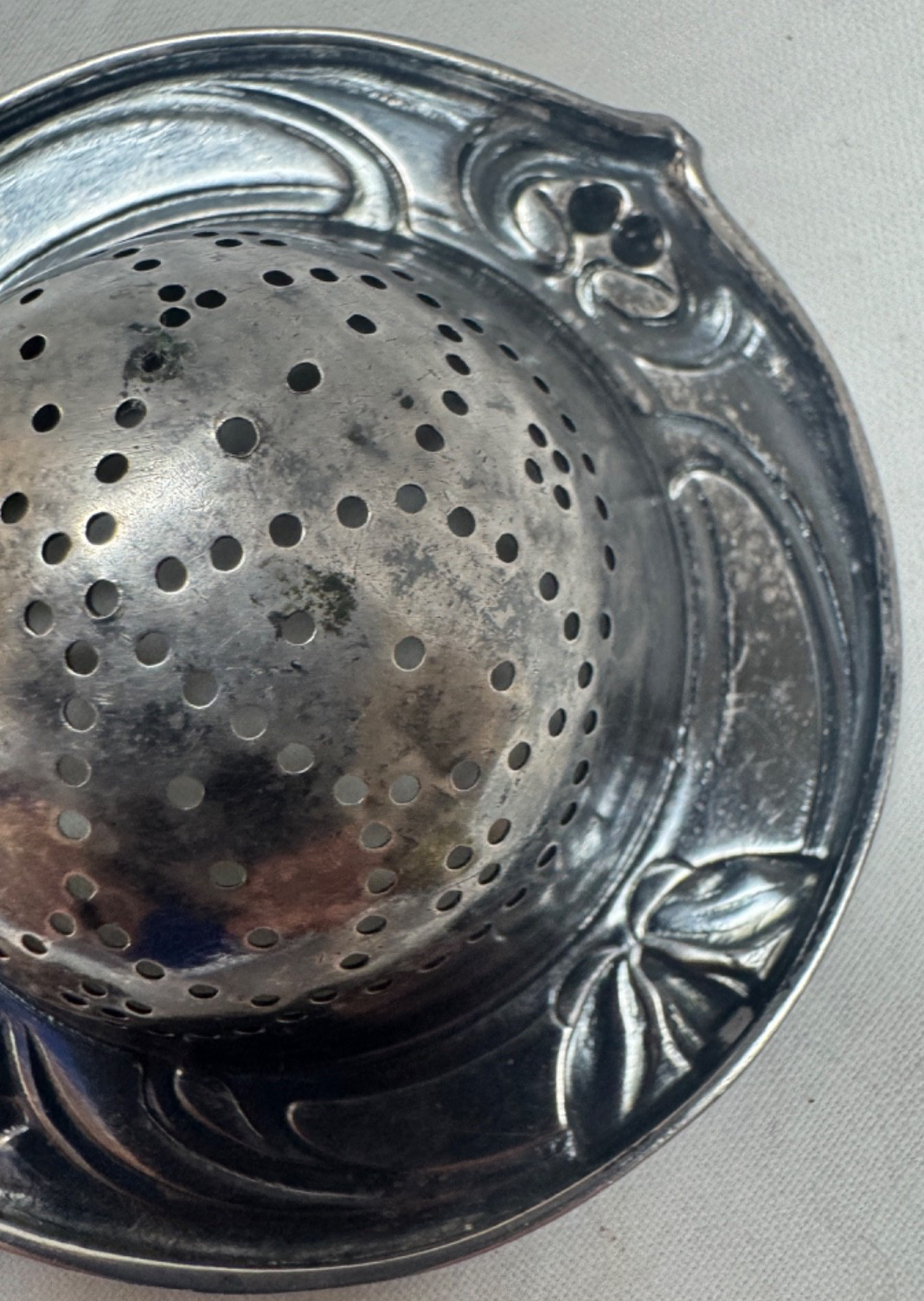 TWO VINTAGE TEA STRAINERS