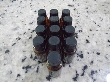 Bakers dozen brown small Doterra oil bottles  Empty, not washed  13 in all.